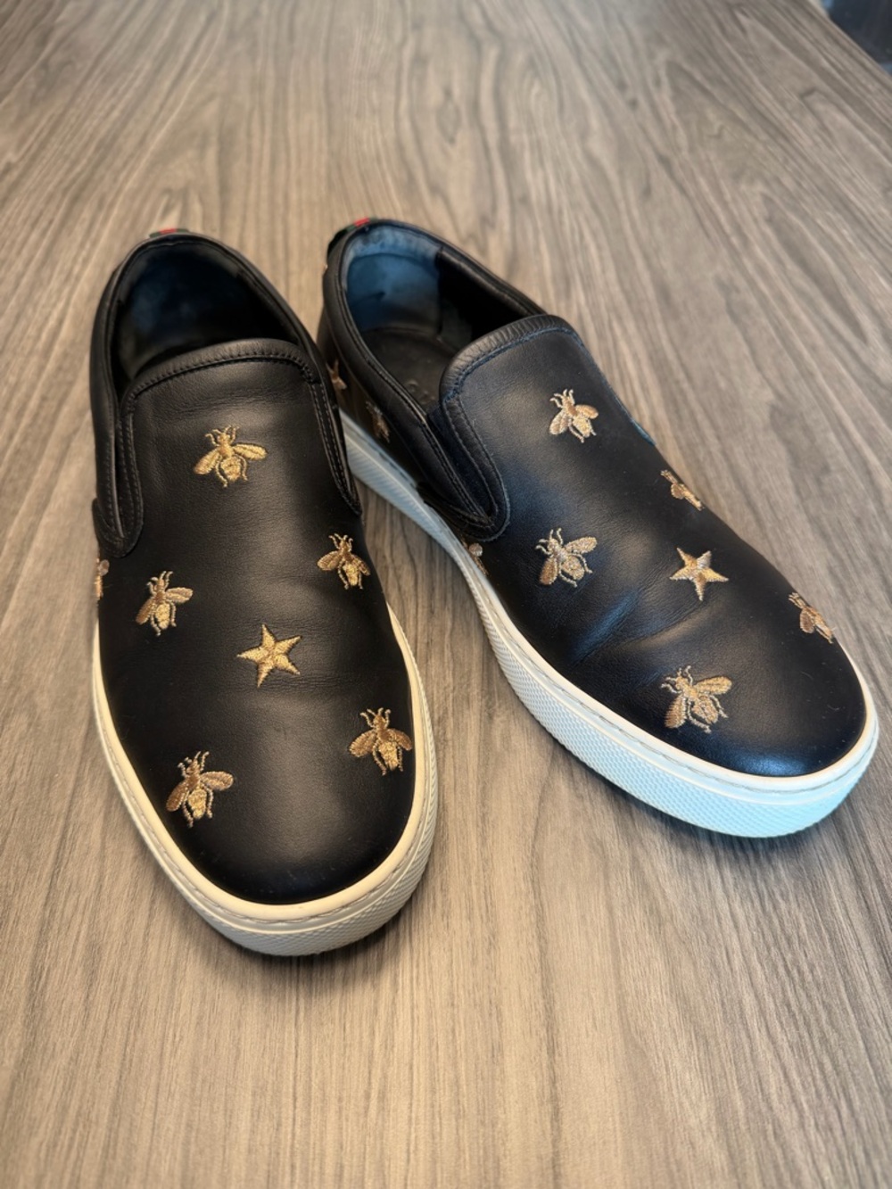 Gucci Black Leather Slip-On Sneakers with Gold Bee & Star Embroidery